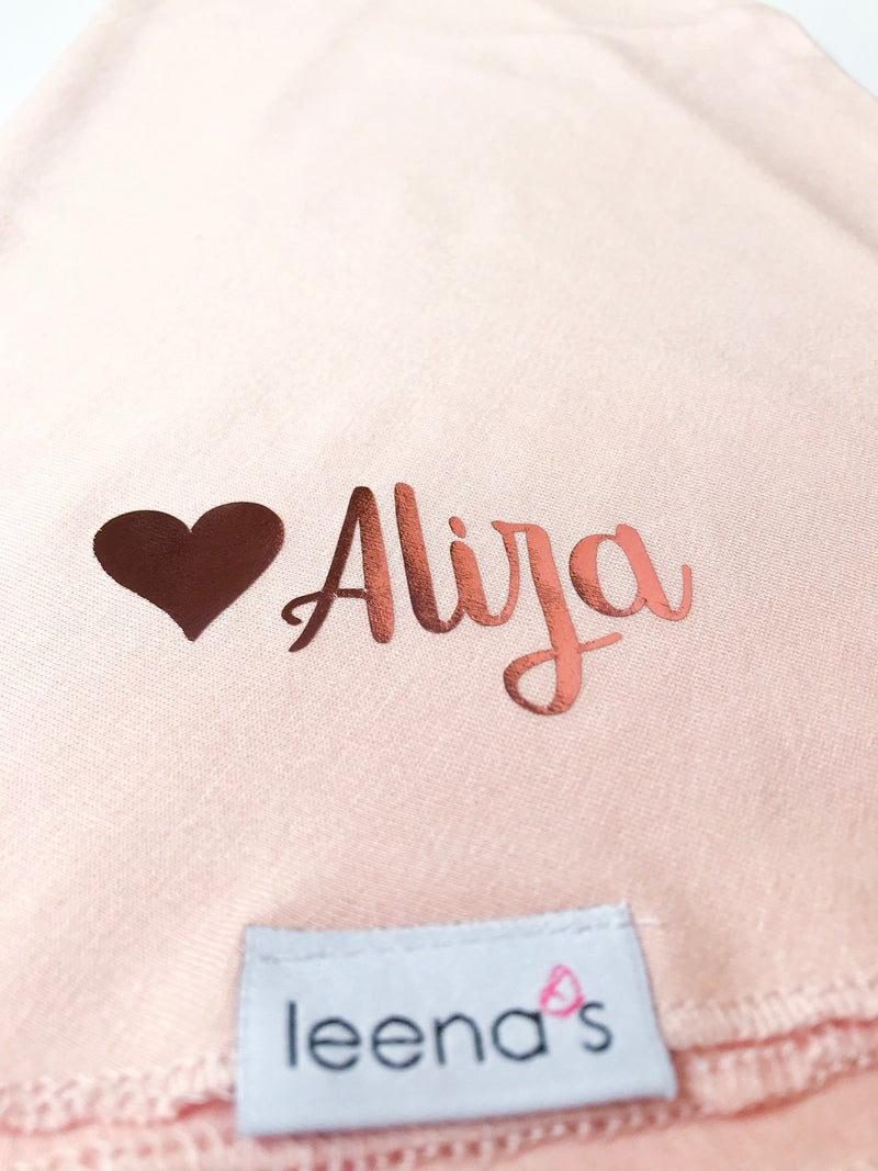 Customized casual blush hijab with the name Aliya printed with a heart to the left of the name in rose gold